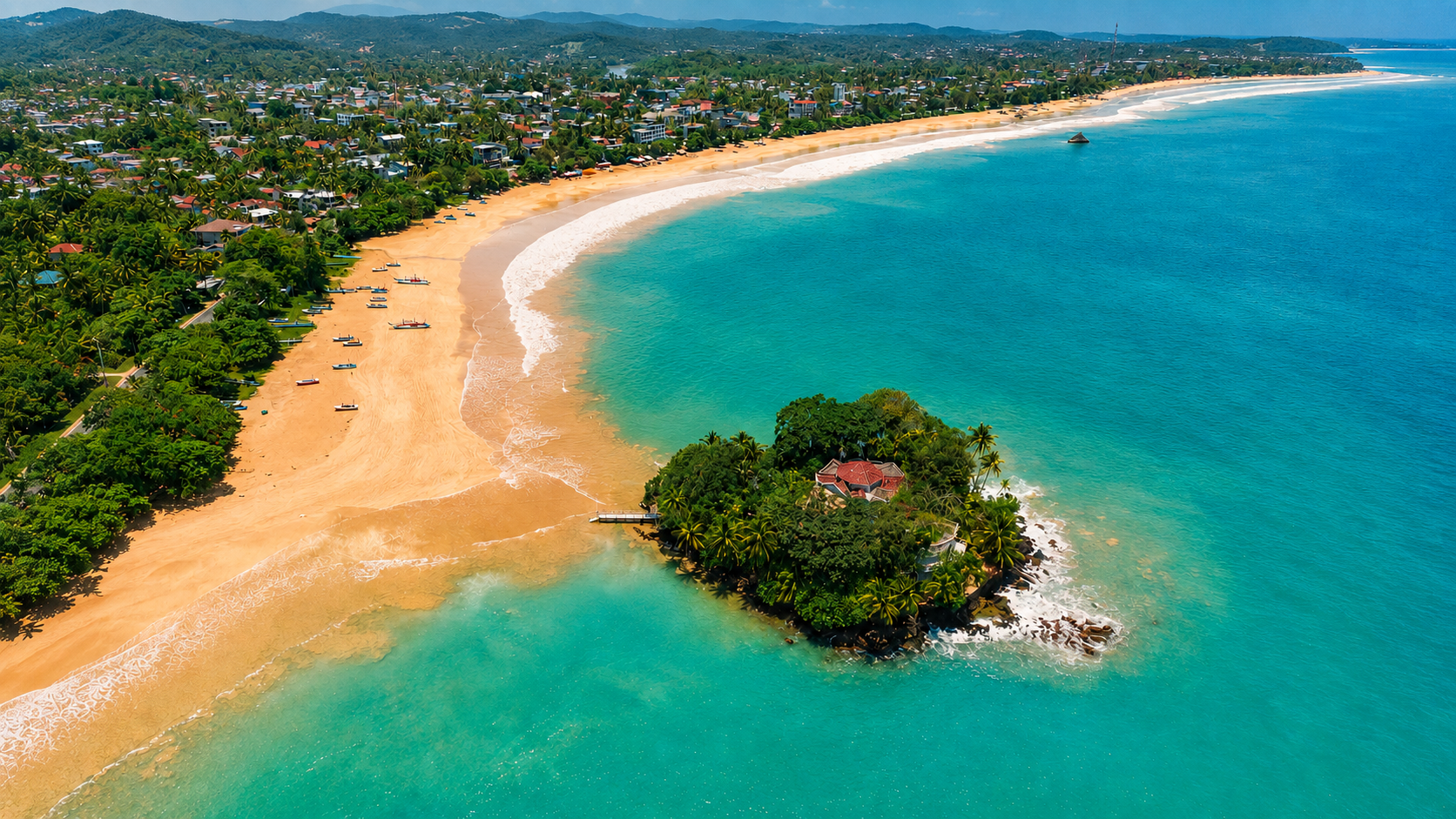 Aerial view of Weligama Bay with Taprobane Island and golden beach