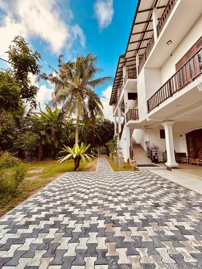 Paved garden walkway at Riverwood Villa